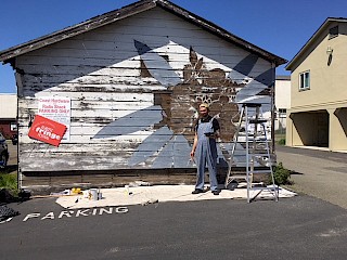 Then he removed all the previous paint in the areas the mural would cover. gallery image